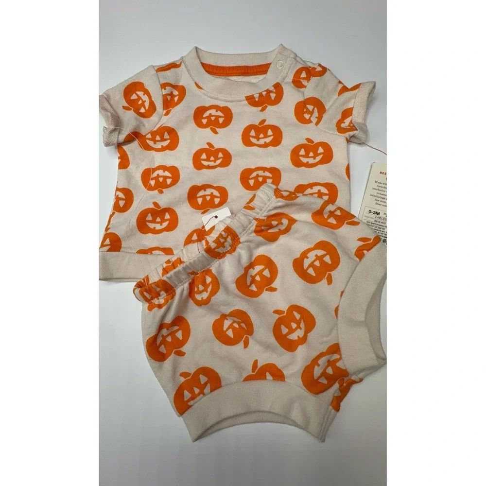 NEW infant size 0-3 months off white and pumpkin orange two piece outfit. Unisex